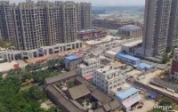原创 中国最“执着”的钉子户,拒绝富商一亿拆迁款,放言百亿也不会卖
