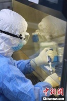 走近核酸检测员：与病毒短兵相接