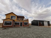 走向我们的小康生活：美丽草原上的“洋别墅”