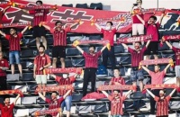 中超恢复观众入场 既“开门”又“织网”