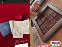 梁洛施晒高奢赠礼，照片中的小肉手抢镜，疑似是其儿子出镜