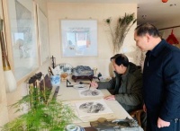 市营协会长周新刚与著名书画家孙海君先生座谈交流