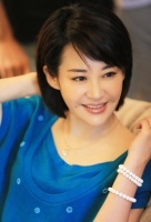 她是张艺谋与冯小刚最欣赏的女人,如今55岁却还是单身!