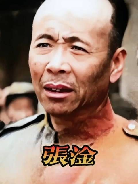 照片中这个满脸胡茬,看上去比较沮丧的人,是国民党陆军中将……